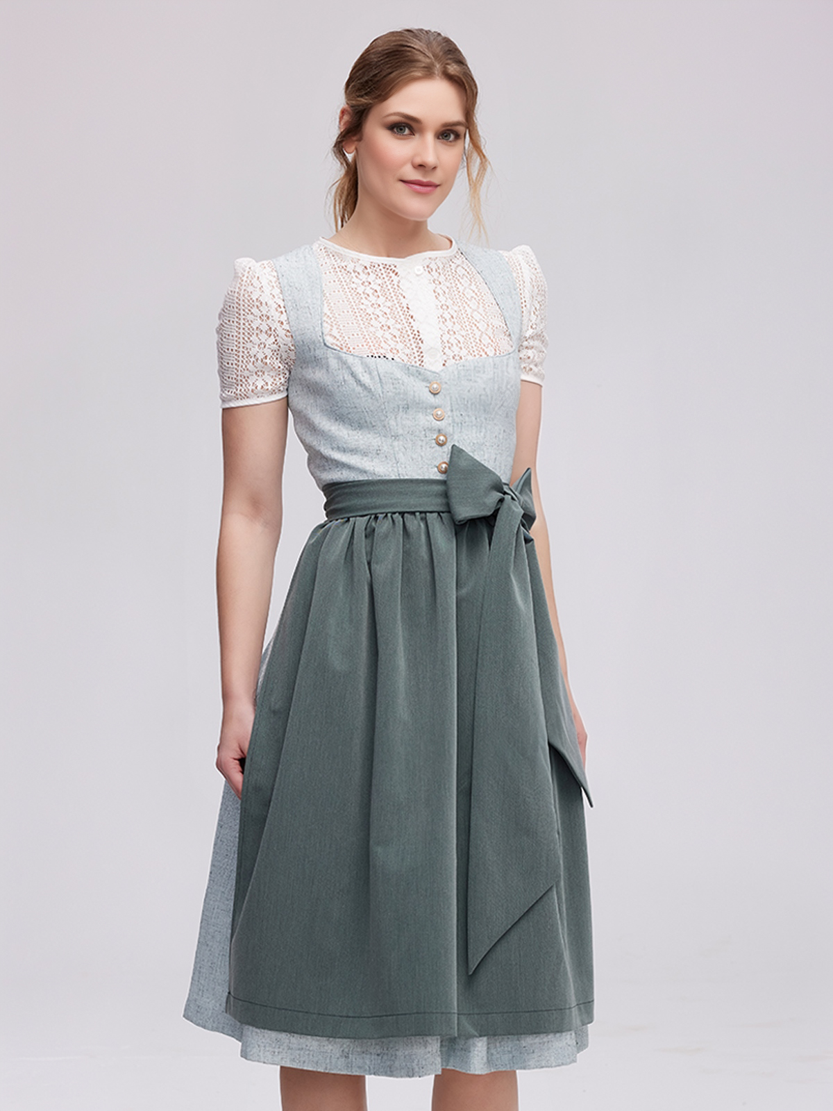 Ein bezauberndes grünes Dirndl mit feinen Details